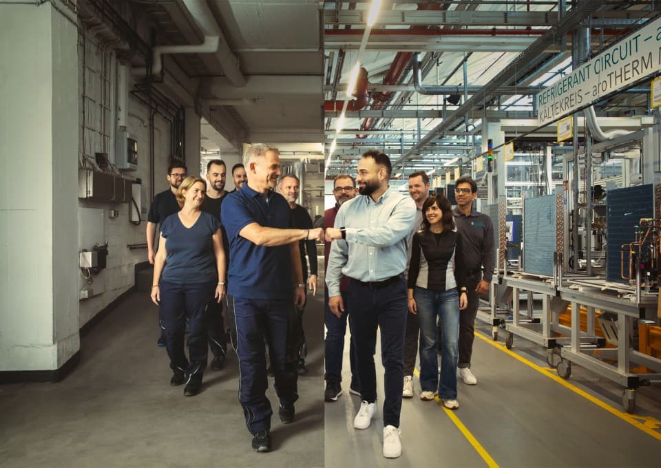 Professional and Vaillant employee give each other a fist bump